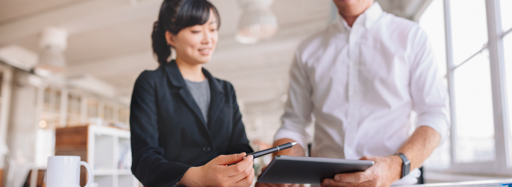 man and woman working together on individual career services