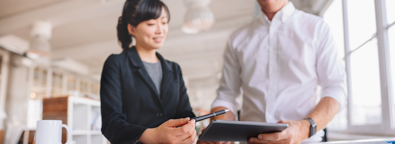 man and woman working together on individual career services