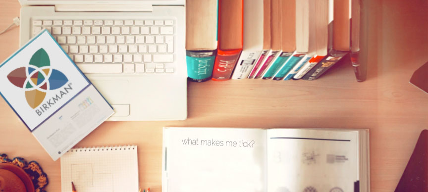 birkman method folder on workdesk with computer and notepad that says "what makes me tick?"