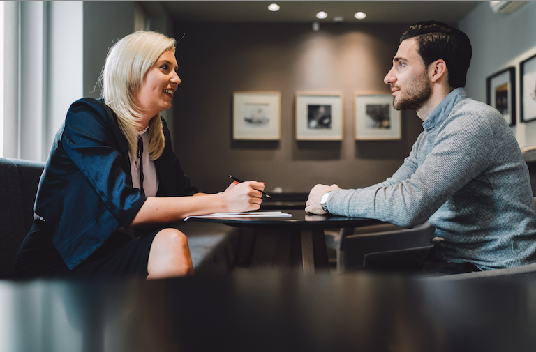 What is a career coach? What are the three primary ways a career coach can help?